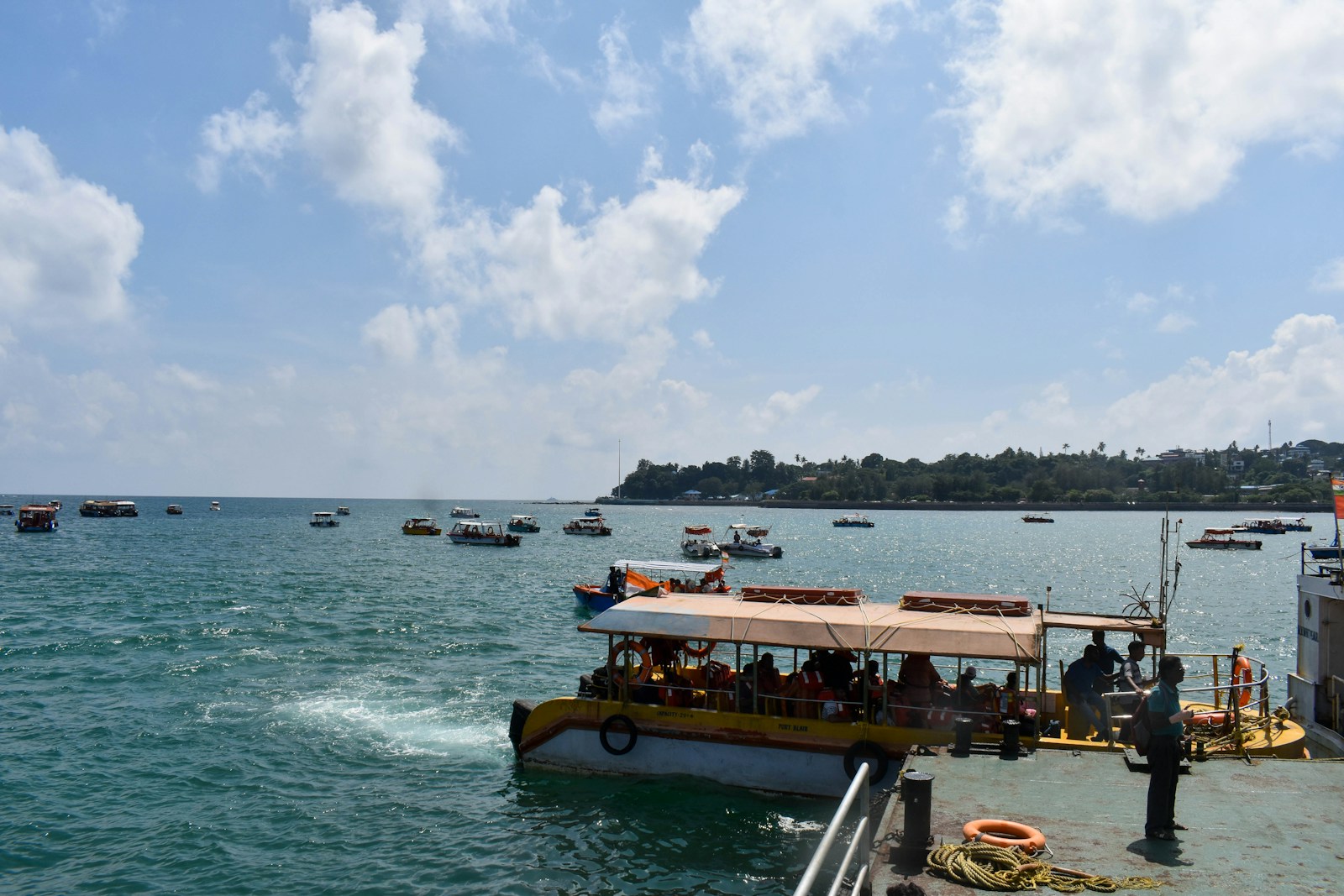 A group of people on a boat in the water