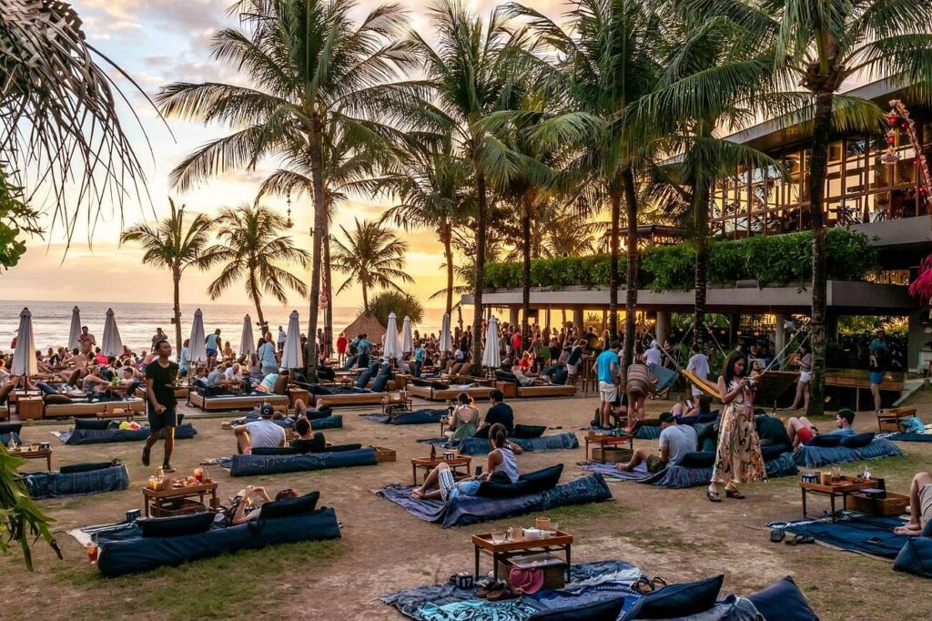 enjoy drinks and watch a warm sunset at the world famous potato head beach club