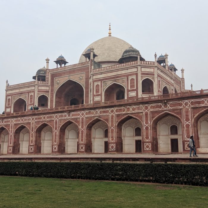 Delhi 3 a large brick building with a dome on top of it